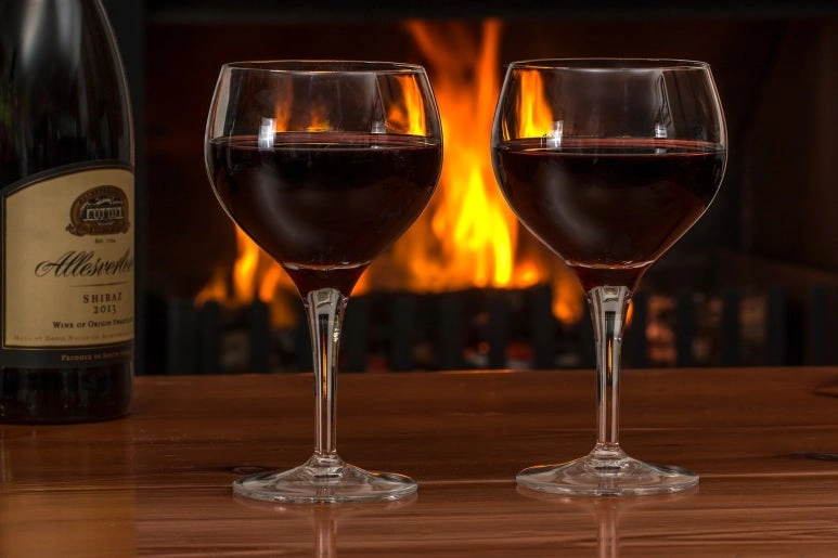A bottle of red wine given as a thank-you gift